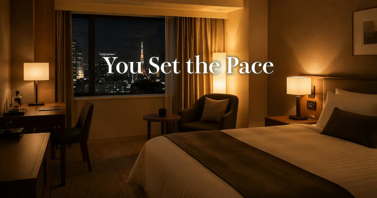 Warm lamplight in a quiet Tokyo hotel room prepared for a relaxing evening