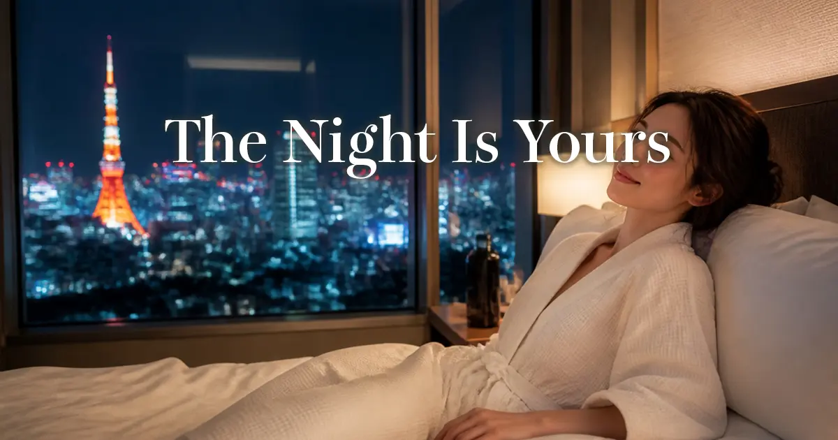 Woman resting in a hotel bed after a session with Tokyo city lights in the background