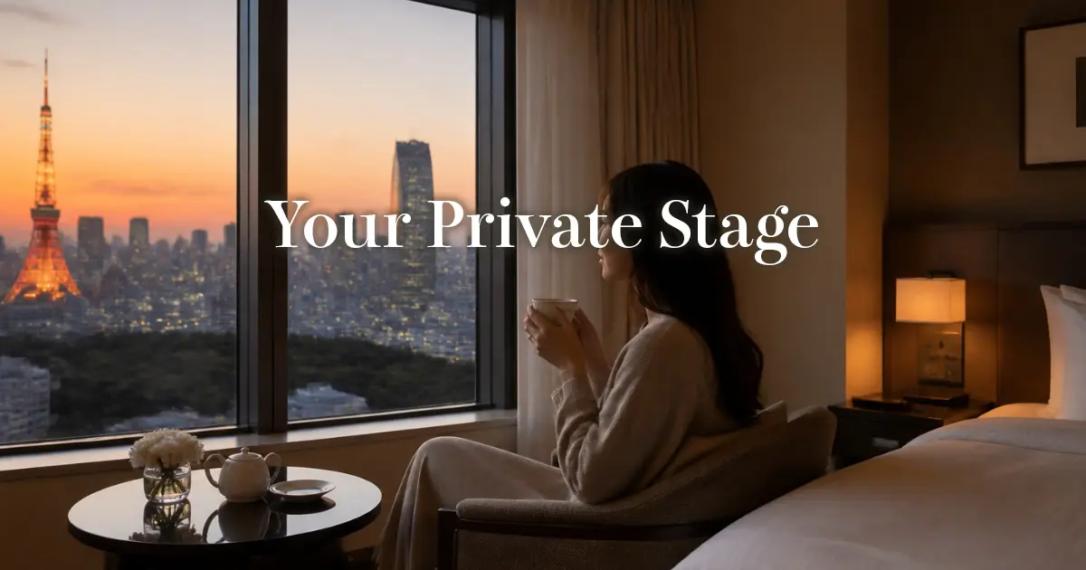 Woman relaxing with tea by the window of a Tokyo hotel room in the evening