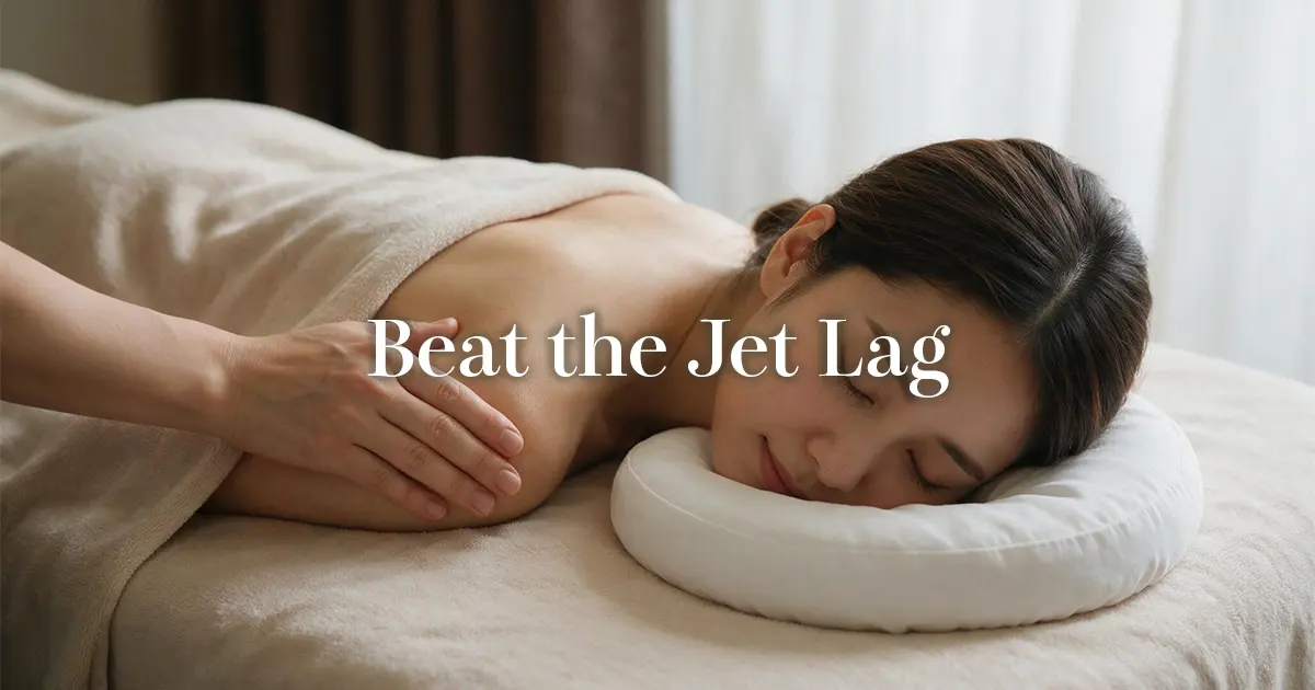 Woman relaxing face down during a gentle massage in soft hotel lighting