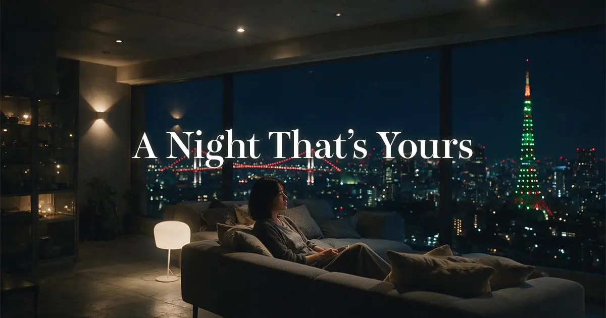Woman enjoying a quiet evening alone with Tokyo city lights beyond the window